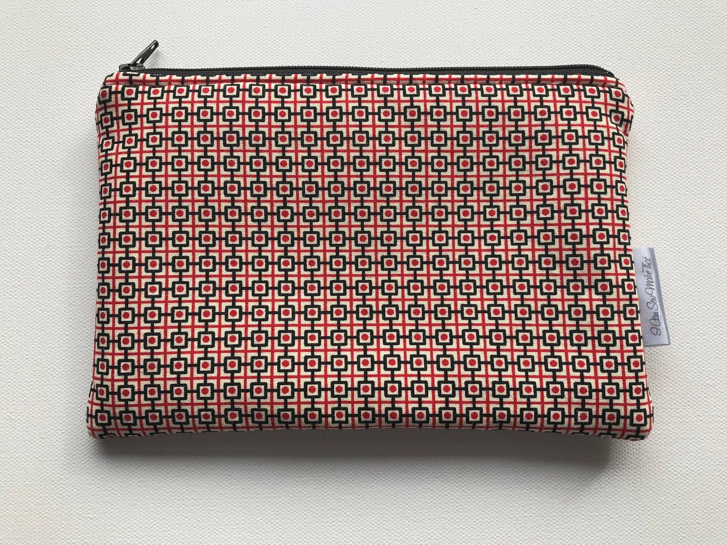 Notion Pouch - Red/white/black geometric pattern